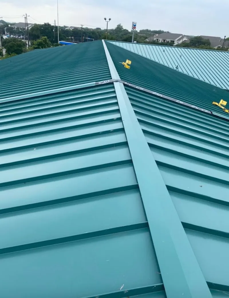 Green commercial metal roof ridge and valley for Metal Roof Repair in Franklin Town